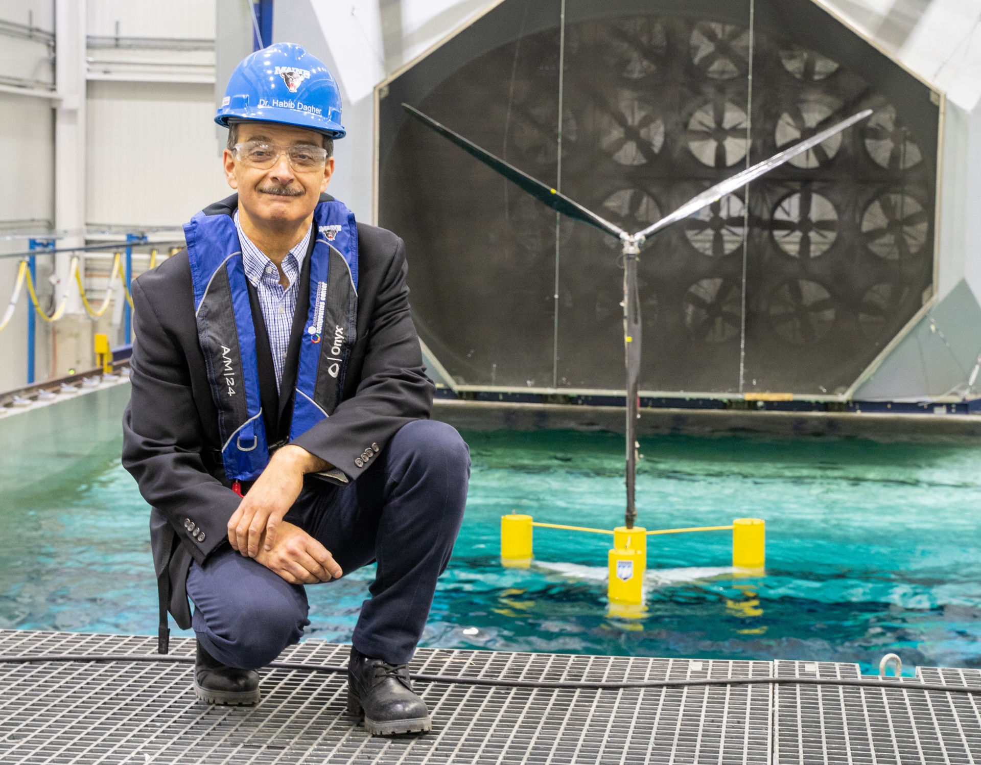 Maine Floating Offshore Wind Research Array: University of Maine's Habib Dagher with VolturnUS floating wind concept model during wave tank tests